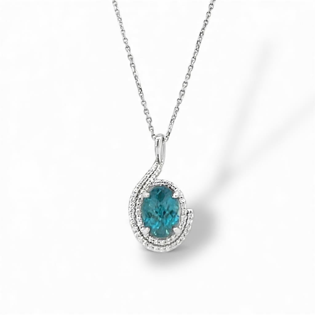 14 Kt White Gold Blue Zircon and Diamond Swirl Pendant