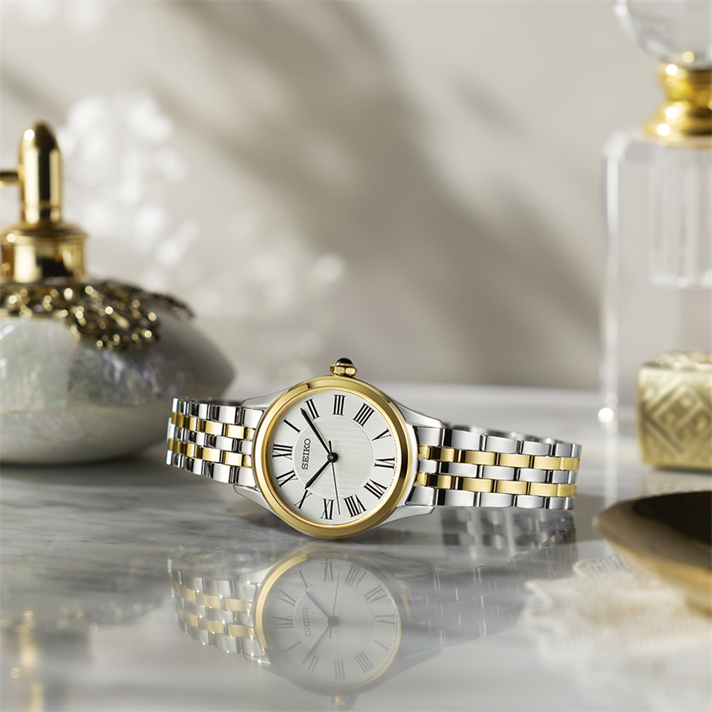 Seiko Essentials Two-Tone Stainless Steel Silver Roman Numeral Dial Watch – Ref. SUR612