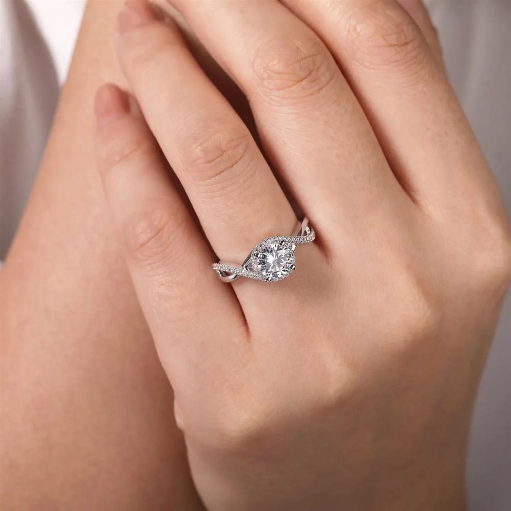 14kt White Gold Diamond Halo Twist Shank Engagement Ring14kt White Gold Diamond Halo Twist Shank Engagement Ring