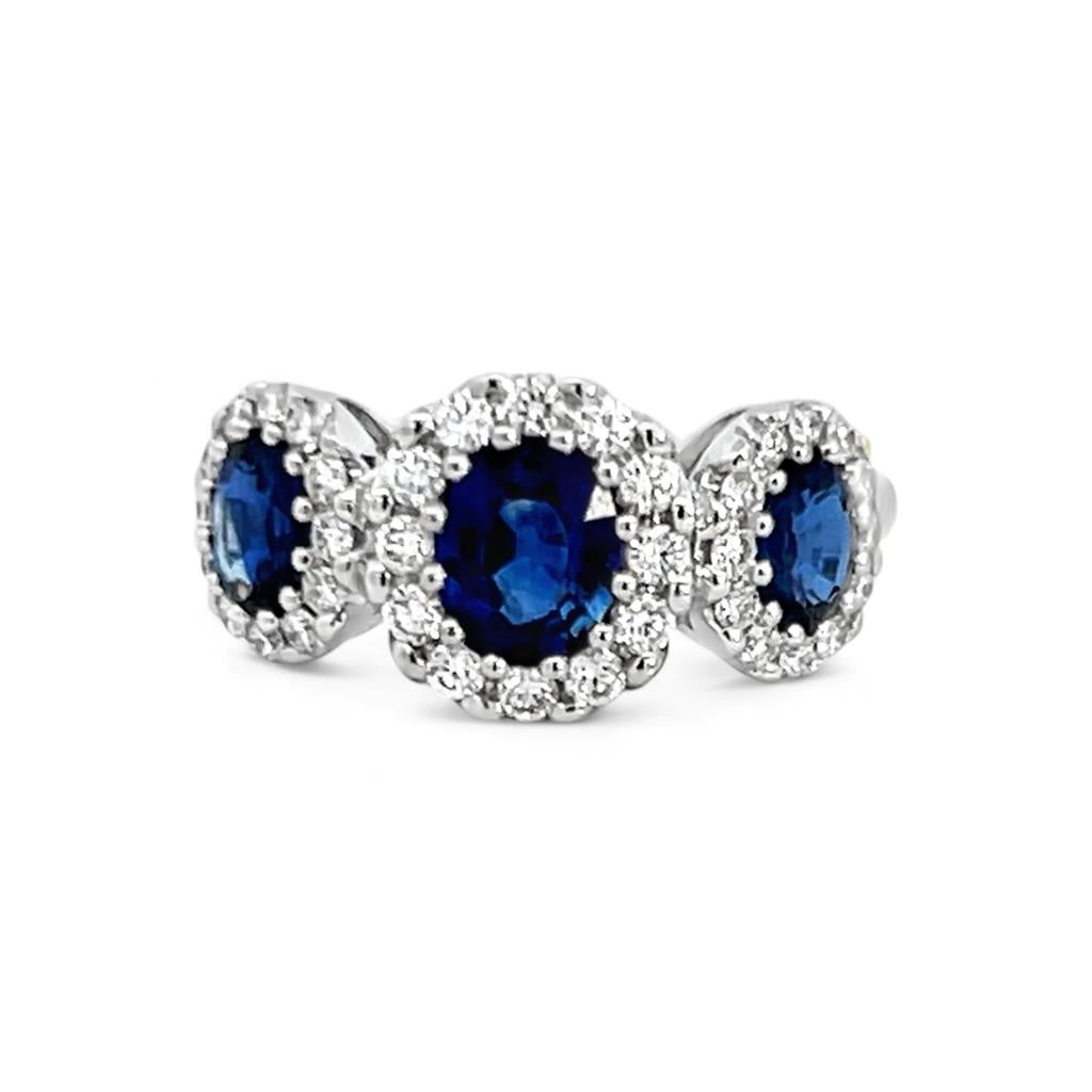 18kt White Gold Diamond and Sapphire 3-Stone Halo Fashion Ring