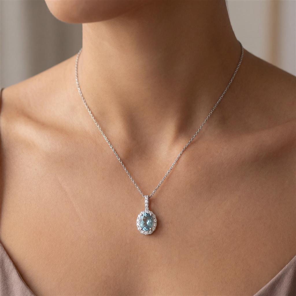 18kt White Gold Aquamarine & Diamond Halo Pendant Necklace