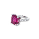 Exquisite pink gemstone ring in white gold with diamond accents, perfect for elegant occasions.