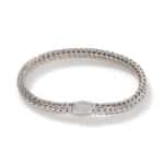 Elegant silver bracelet with intricate woven design and sparkling clasp, perfect for any occasion.