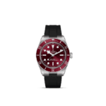 Tudor dive watch with burgundy dial, stainless steel case, and durable rubber strap.