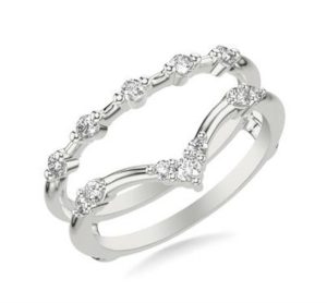 Elegant interlocking diamond ring in white metal, perfect for engagements or special occasions.